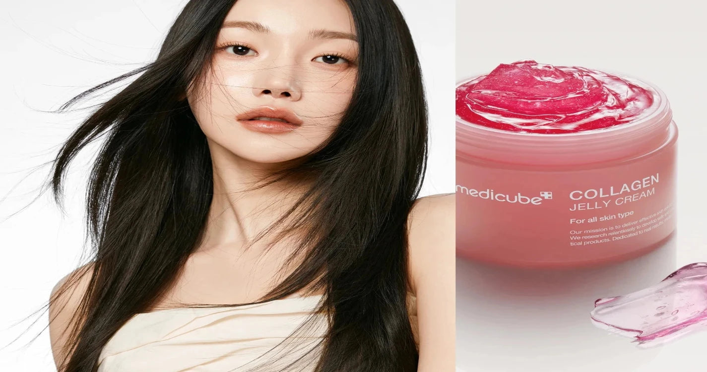 Woman with long black hair next to jars of pink cream on a white background